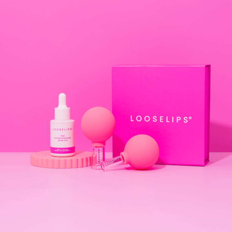 photo of the looselips supercharged bakuchiol skin oil and face lifters against a bright pink background